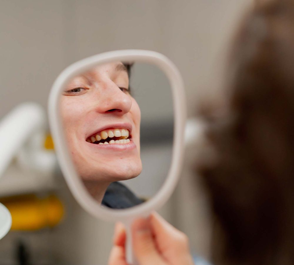 close-up-dental-office-a-young-guy-sits-in-chair-a-LCZTTP4.jpg